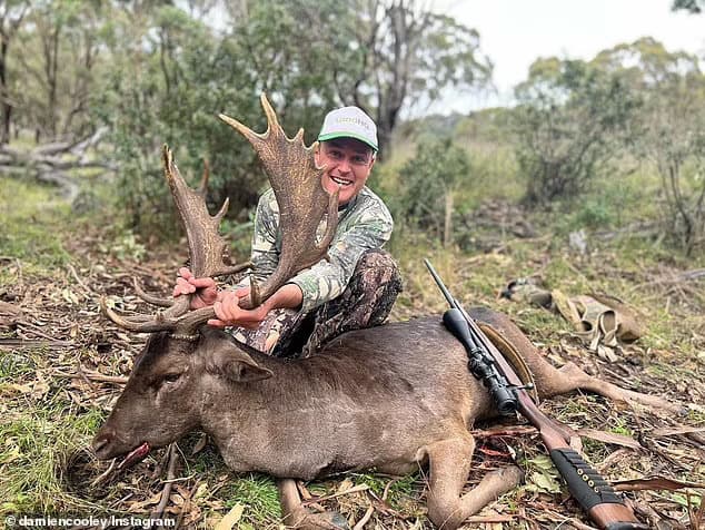 Five-time winning auctioneer on The Block Damien Cooley has responded to his critics after he celebrated killing a deer and posted this photo on Instagram on Tuesday