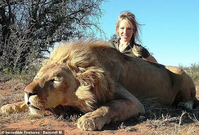 A U.S. celebrity hunter Olivia Nalos Opre poses with her kill